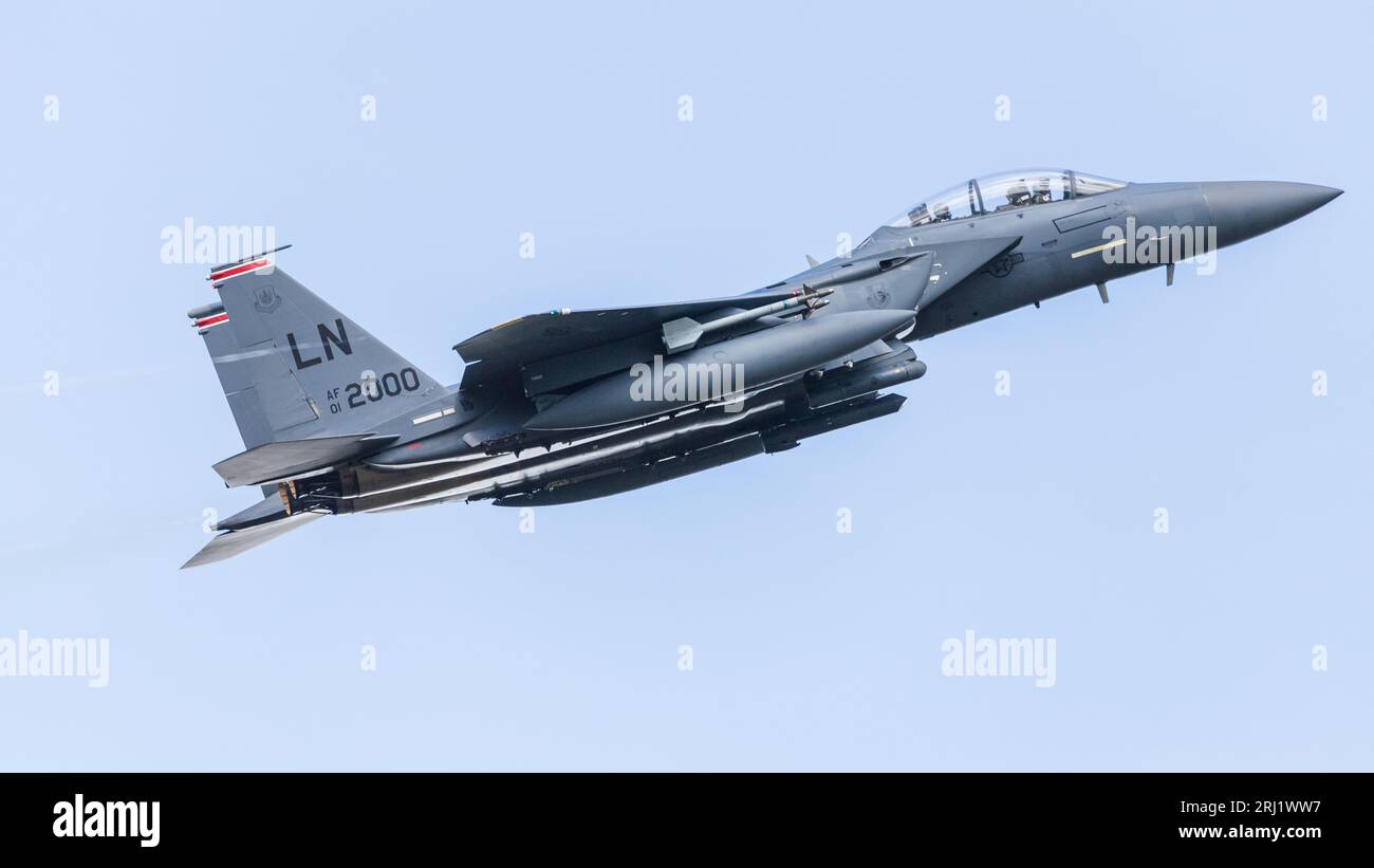 An F-15E Strike Eagle from the 494th Fighter Squadron or Panthers departs RAF Lakenheath in Suffolk on a training sortie in August 2023. Stock Photo