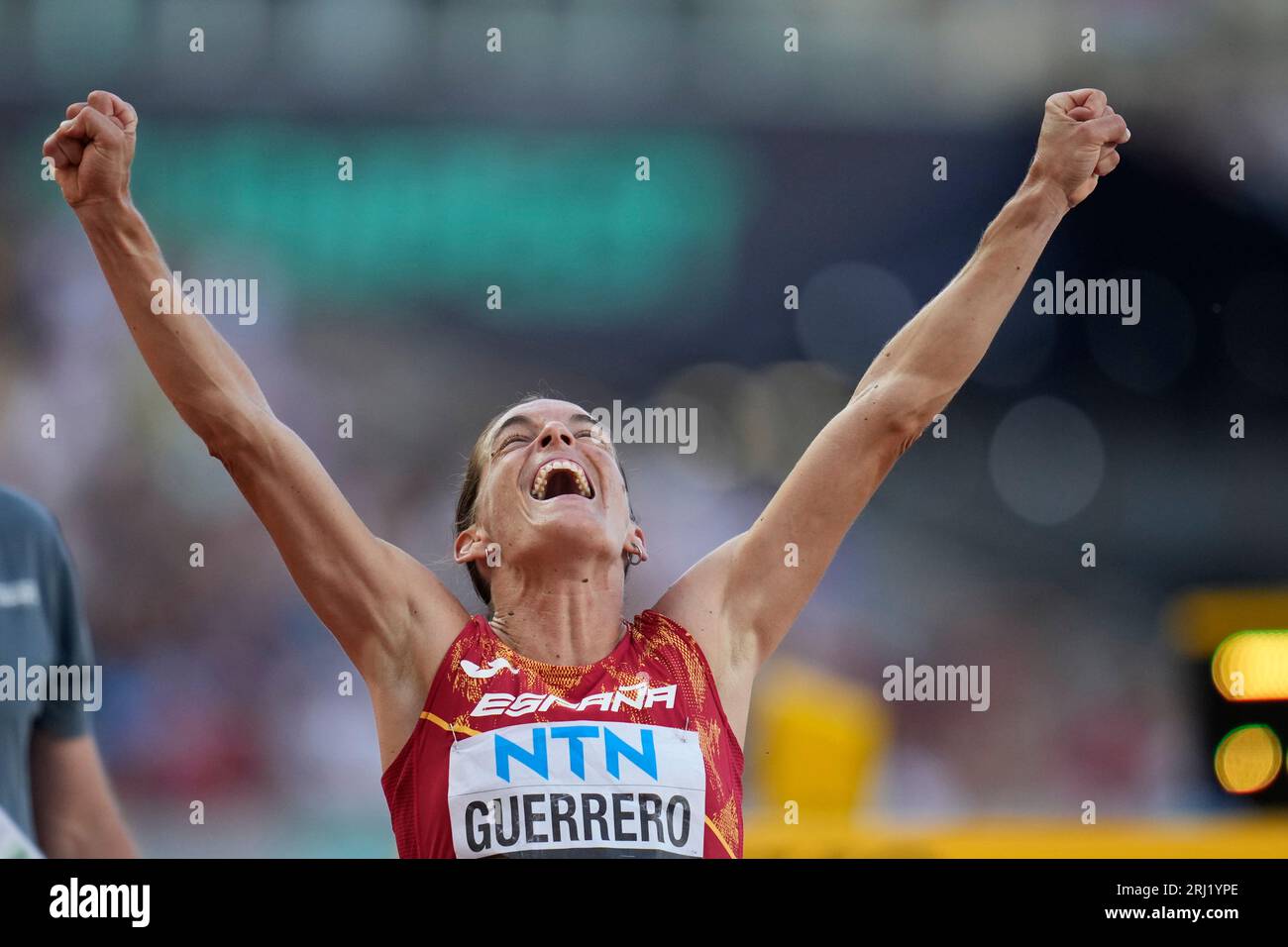 Esther Guerrero, of Spain, reacts as she see her time a personal best
