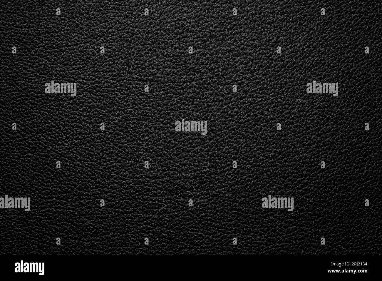 black leather background, natural hide texture closeup Stock Photo