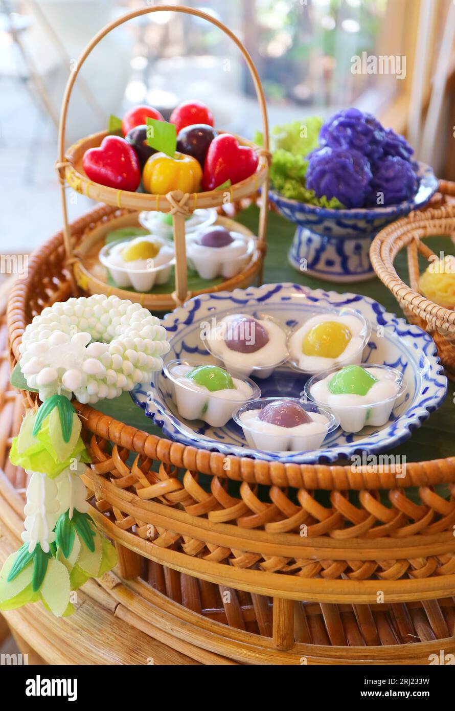 Set of Colorful Thai Traditional Sweets Mainly Made of Coconut Milk and Sweetened Mung Beans Stock Photo