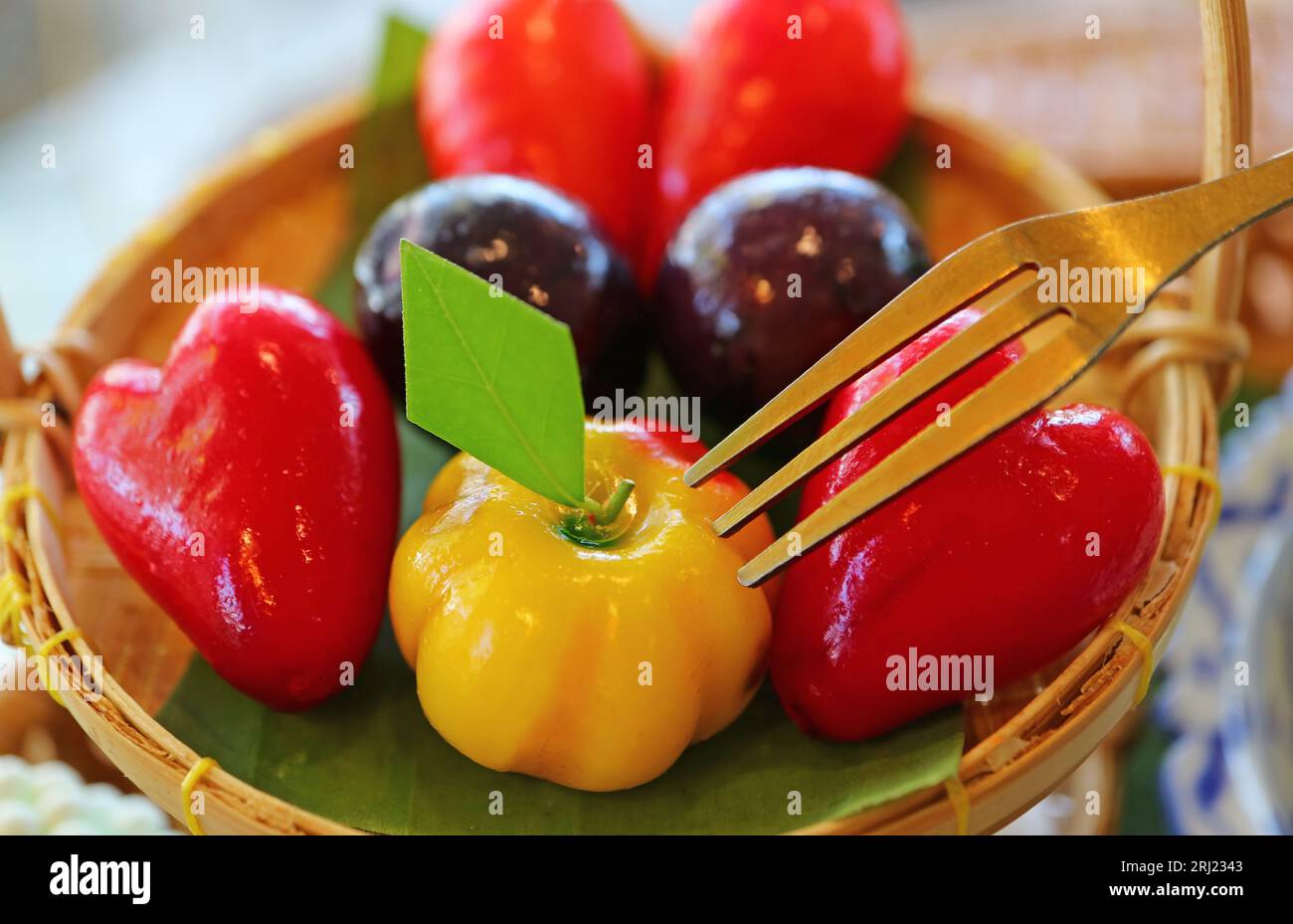 Plate of Mini Fruits and Vegetables Shaped Thai Style Marzipan Called Kanom Look Choup, a Famous Thai Traditional Dessert Stock Photo
