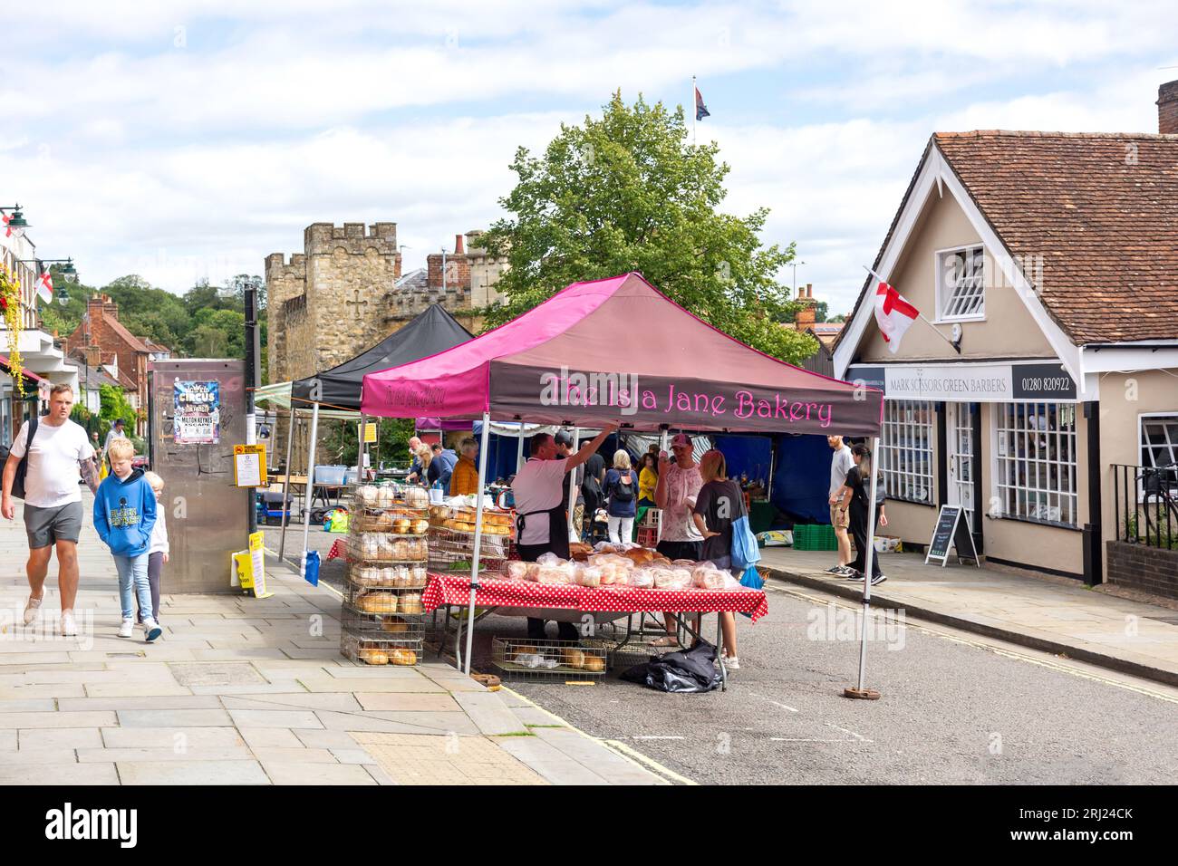 Bakery stall at Buckingham Street Market, Market Square, Buckingham, Buckinghamshire, England