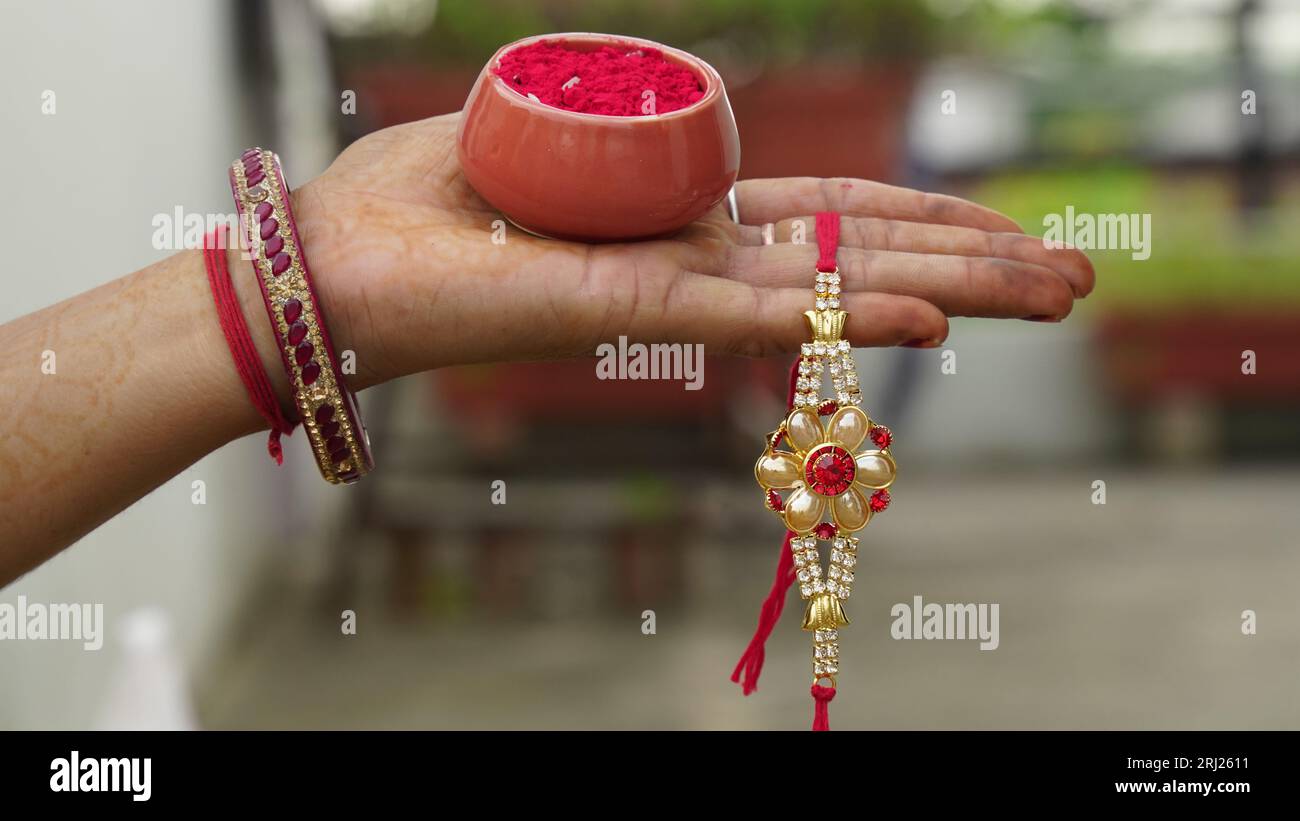 Indian festival: Raksha Bandhan. A traditional Indian wrist band which is a symbol of love between Brothers and Sisters. Stock Photo