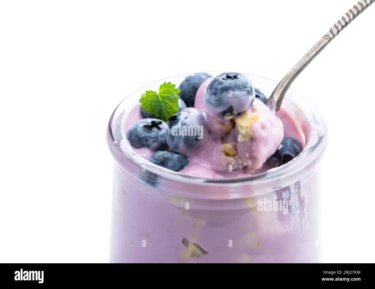 Fresh  natural homemade organic yogurt with blueberry in a glass jar isolated on white Stock Photo