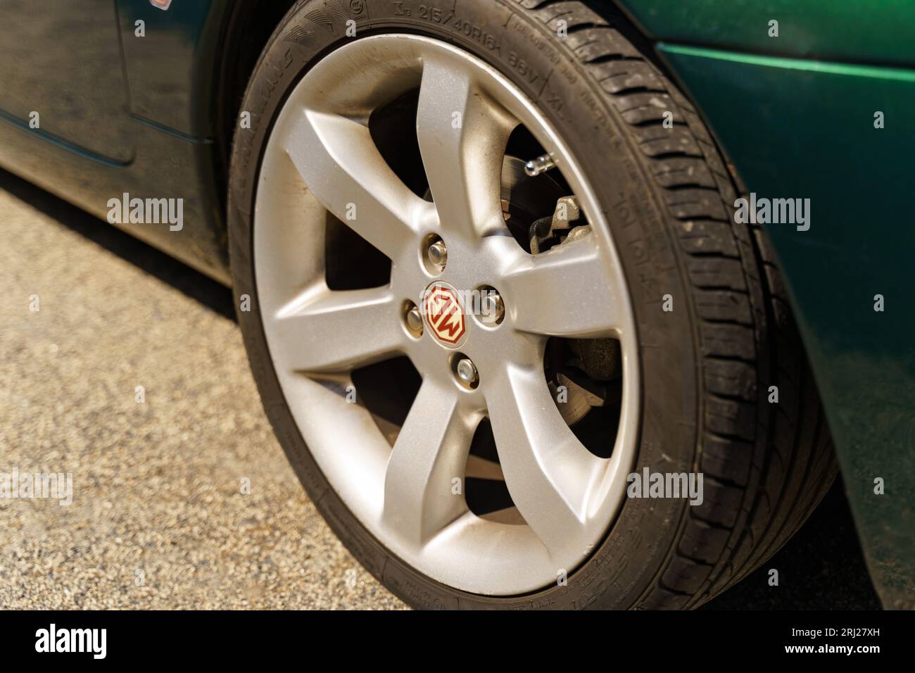 Langeac, France - May 27, 2023: MG MGF green sports car at the classic car show. View of the chrome wheels with the logo. Stock Photo