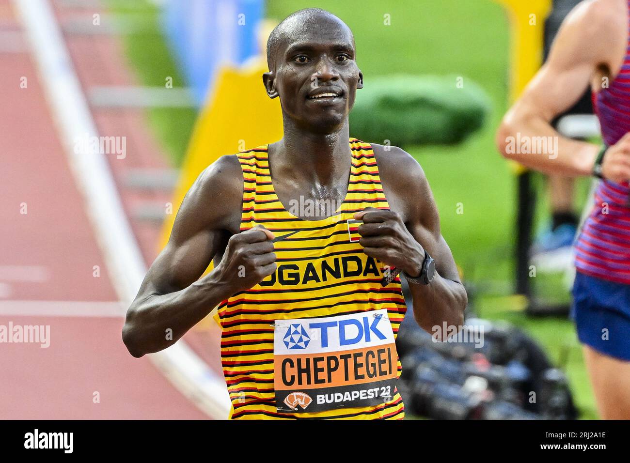 Budapest, Hungary. 20th Aug, 2023. Ugandan Joshua Cheptegei celebrates as he crosses the finish line of the 10000m men final at the World Athletics Championships in Budapest, Hungary on Sunday 20 August 2023. The Worlds are taking place from 19 to 27 August 2023. BELGA PHOTO ERIC LALMAND Credit: Belga News Agency/Alamy Live News Stock Photo