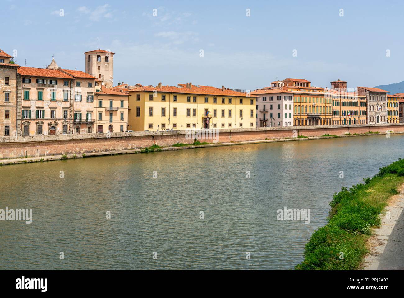 Beautiful sight in Pisa with the Arno River on a sunny summer day. Tuscany, Italy. Stock Photo