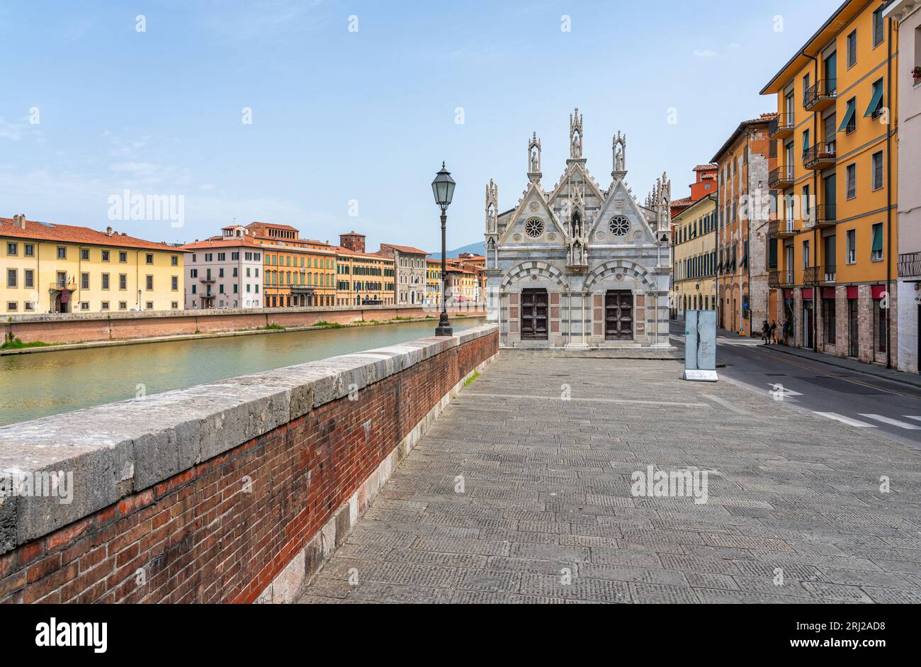 Beautiful sight in Pisa with the Arno River and the Church of Santa Maria della Spina on a sunny summer day. Tuscany, Italy. Stock Photo