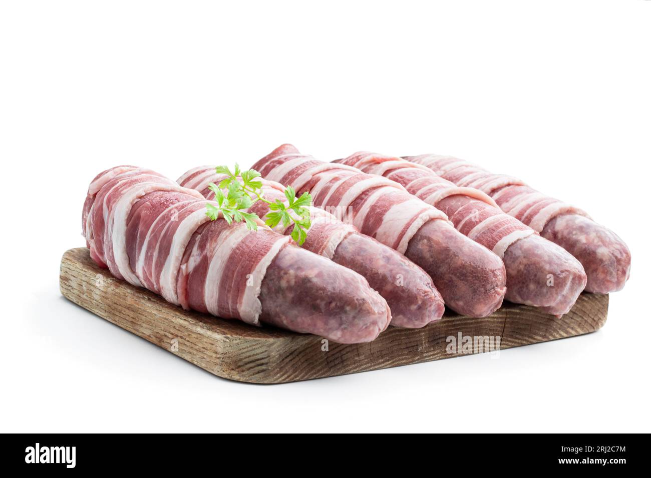 Sausages  wrapped in bacon isolated on white background Stock Photo