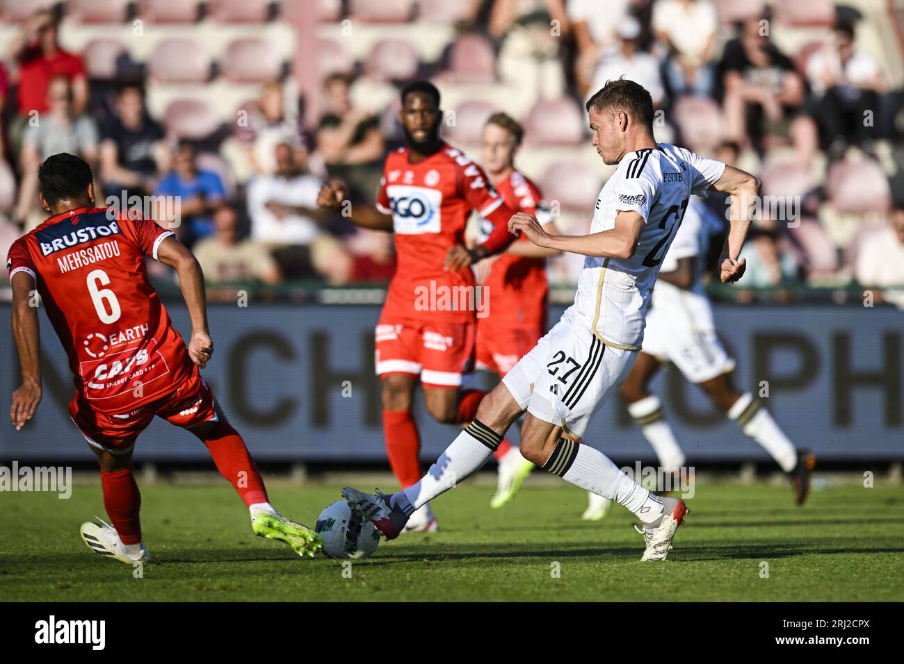 Kortrijk, Belgium. 20th Aug, 2023. Kortrijk's Nayel Mehssatou and Eupen's Alfred Finnbogason pictured in action during a soccer match between KV Kortrijk and KAS Eupen, Sunday 20 August 2023 in Kortrijk, on day 4/30 of the 2023-2024 'Jupiler Pro League' first division of the Belgian championship. BELGA PHOTO TOM GOYVAERTS Credit: Belga News Agency/Alamy Live News Stock Photo