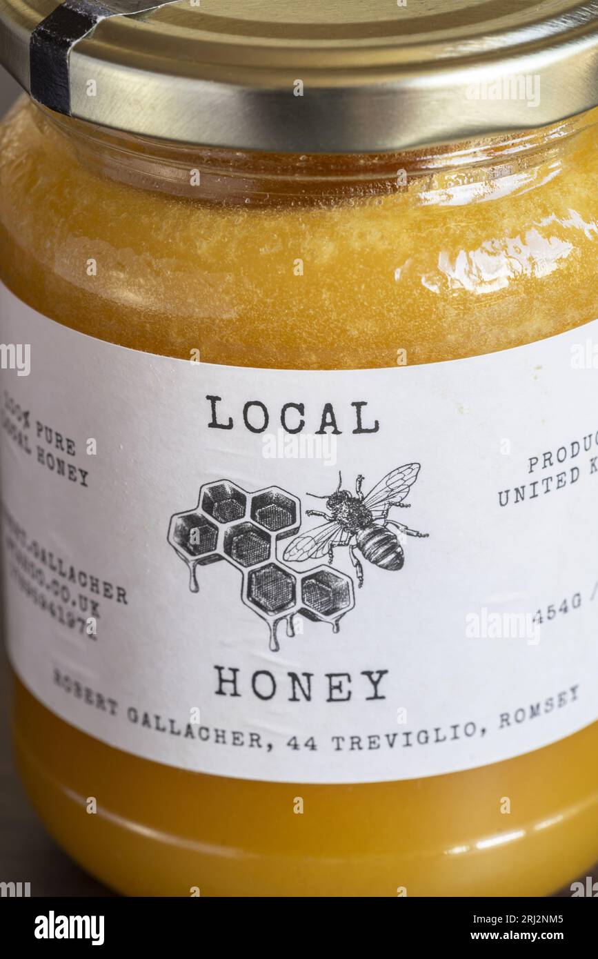 A glass jar of local honey, England, UK Stock Photo Alamy