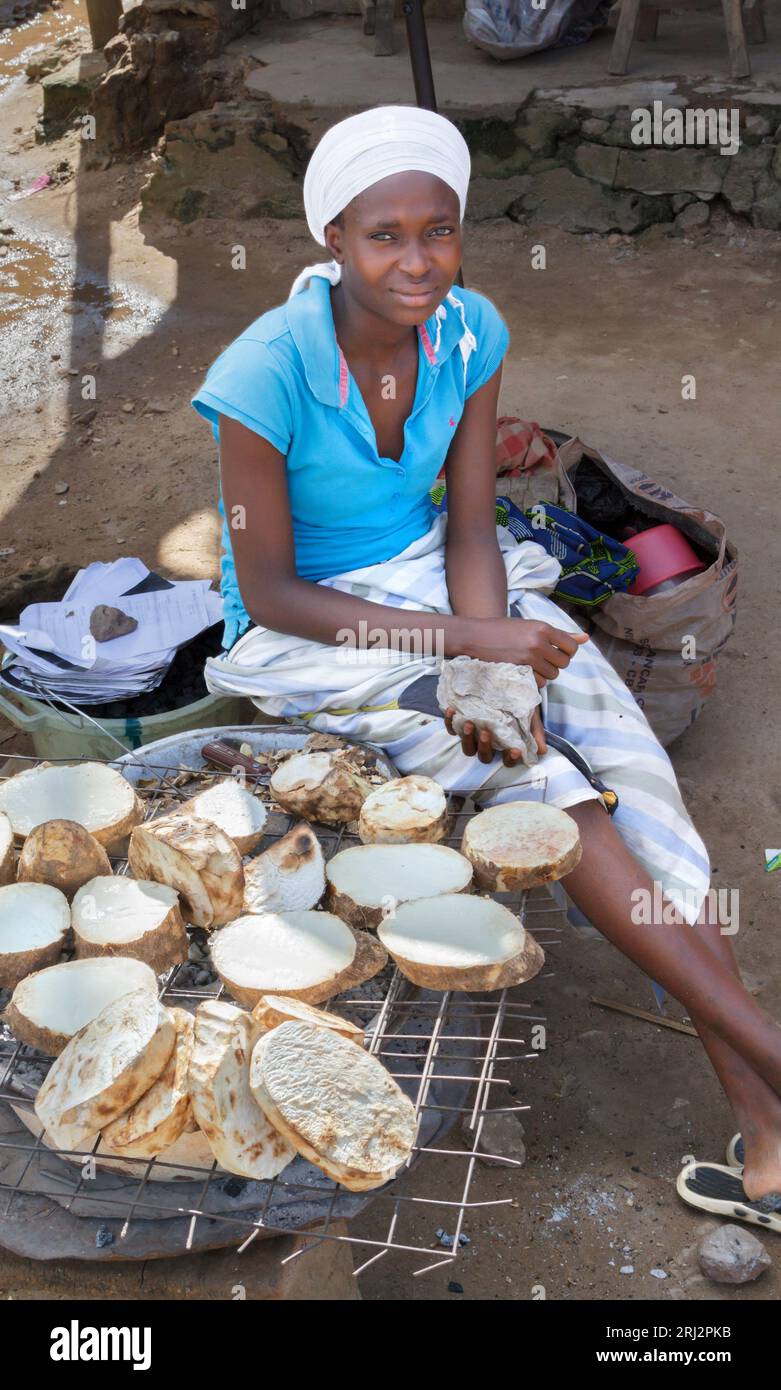 A girl selling fried yam on the street, Acure, Ondo State, Nigeria. Stock Photo