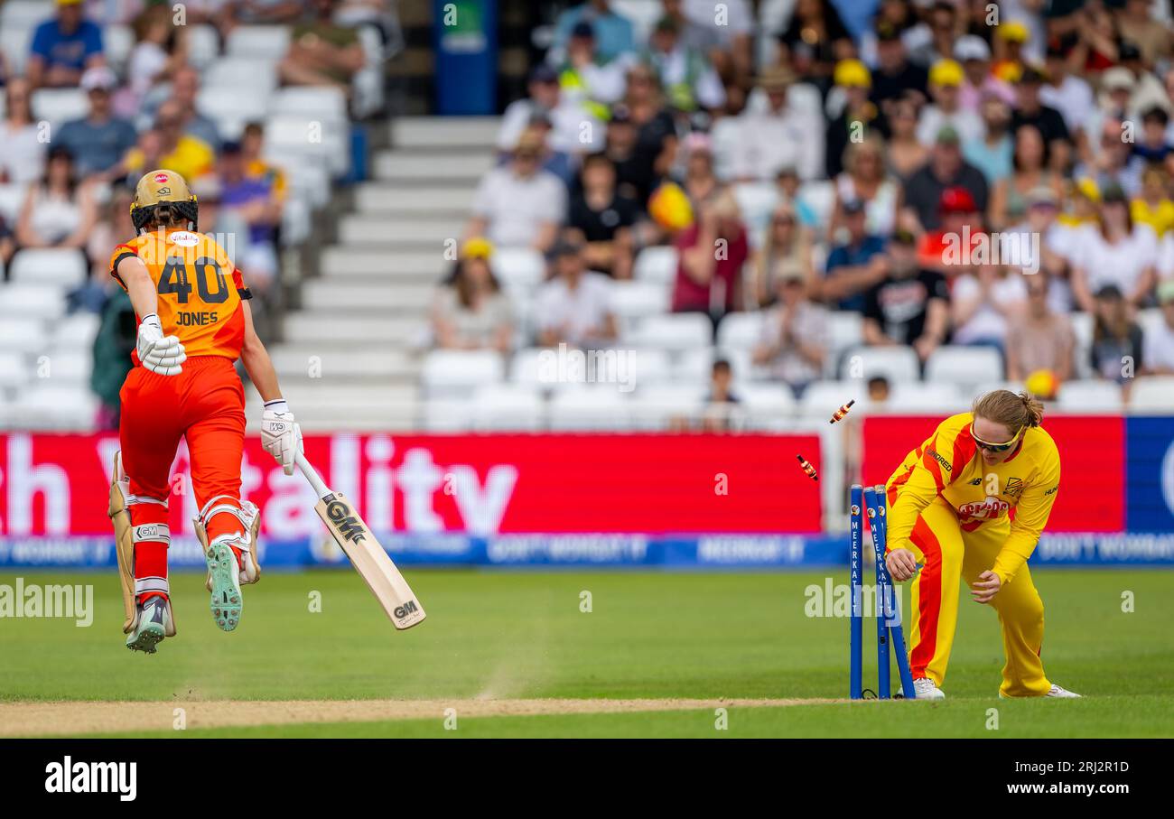 Amy Jones of Birmingham Phoenix avoids a run out. Bryony Smith of Trent Rockets breaking the stumps in The Hundred Stock Photo