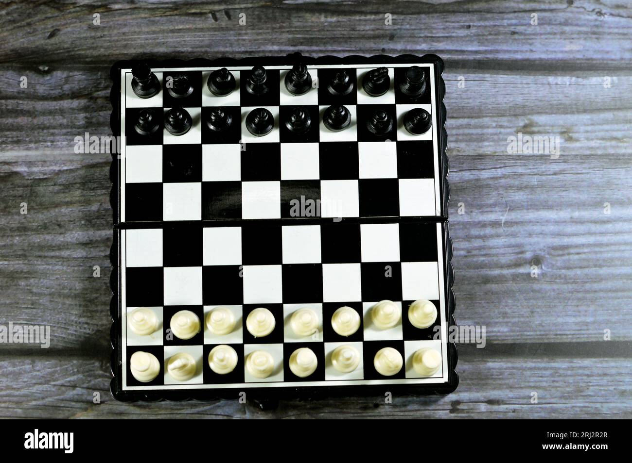 Chess, a board game for two players, called white and black, each