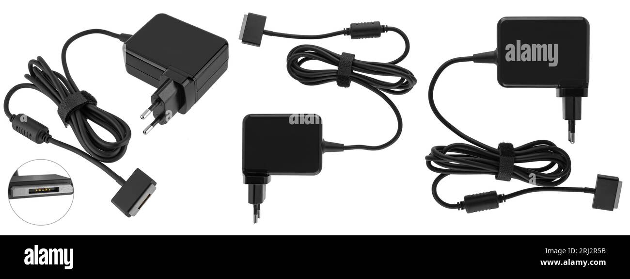 Laptop power adapter, computer spare part on white background in ...