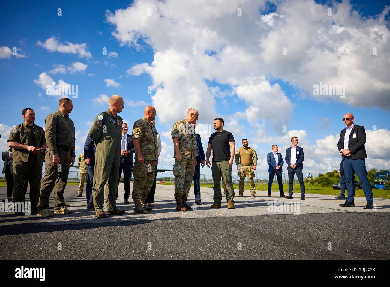 During a working visit to the Kingdom of Denmark, the President of Ukraine, Volodymyr Zelensky ,visited the Fighter Wing Skrydstrup air base of the Royal Danish Air Force.   Accompanied by Prime Minister of Denmark Mette Frederiksen and the Royal Air Force Command, the Head of State familiarized himself with the technical features of F-16 Fighting Falcon jets and the training program for Ukrainian pilots on these aircraft.  He spoke with Ukrainian pilots who are undergoing training on F-16s to protect Ukrainian skies. Stock Photo