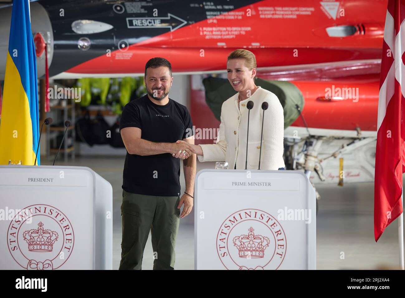 PM Mette Frederiksen in F-16. During a working visit to the Kingdom of Denmark, the President of Ukraine, Volodymyr Zelensky ,visited the Fighter Wing Skrydstrup air base of the Royal Danish Air Force.   During a working visit to the Kingdom of Denmark, the President of Ukraine, Volodymyr Zelensky ,visited the Fighter Wing Skrydstrup air base of the Royal Danish Air Force.   Accompanied by Prime Minister of Denmark Mette Frederiksen and the Royal Air Force Command, the Head of State familiarized himself with the technical features of F-16 Fighting Falcon jets and training program for Ukraine. Stock Photo