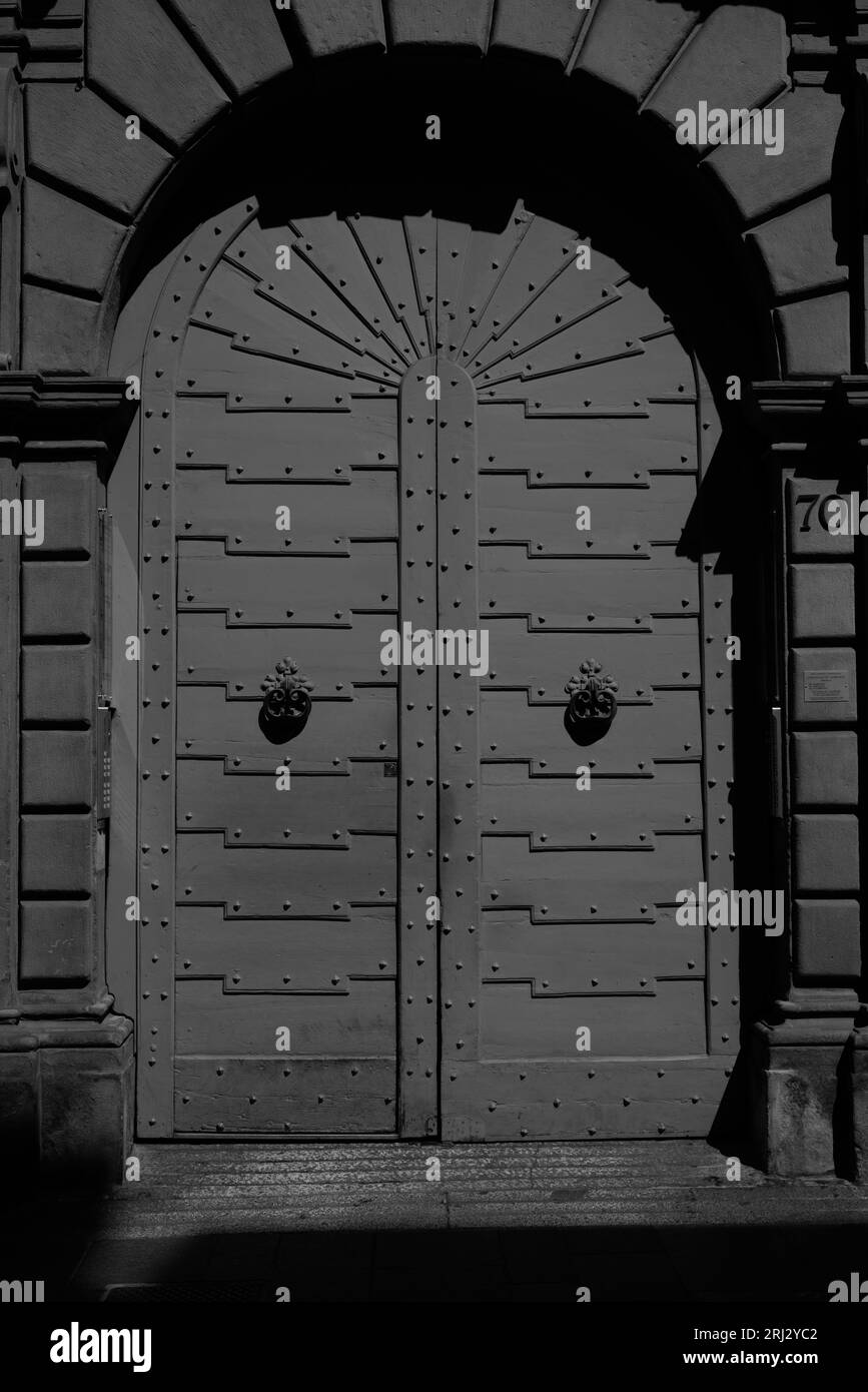 Old wooden doors closed Black and White Stock Photos & Images - Alamy