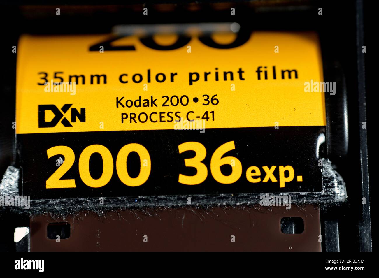 Giza, Egypt, August 12 2023: Kodak 35mm color print roll film,  spool-wound photographic film with characteristic 35mm format sprocket holes for old r Stock Photo