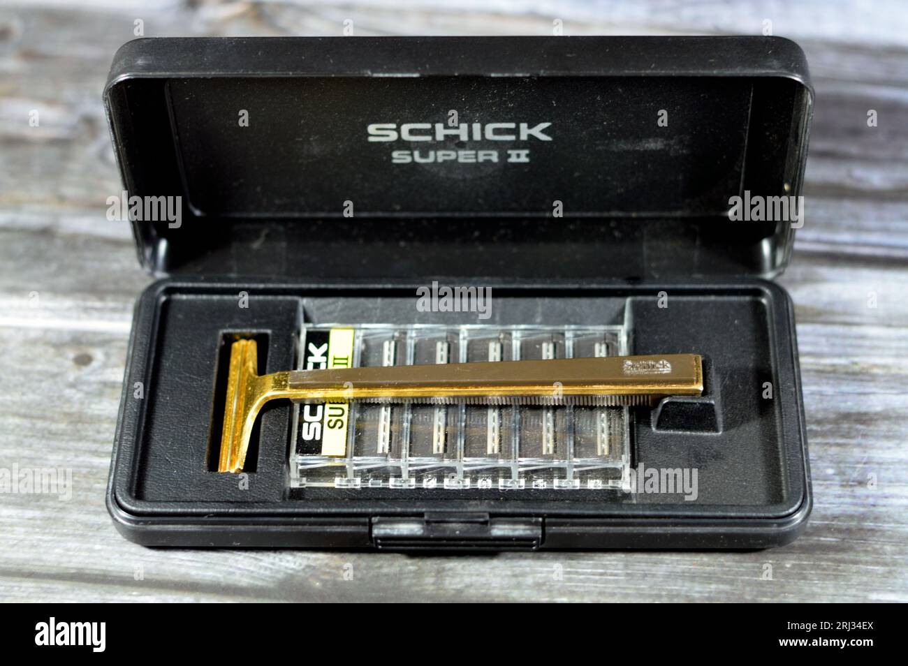 Giza, Egypt, August 12 2023: Old Schick Super II handle and razors, Schick is an American brand of personal care products and razors, founded by Jacob Stock Photo