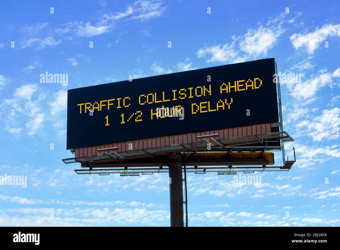 Electronic highway billboard with a traffic collision delay warning