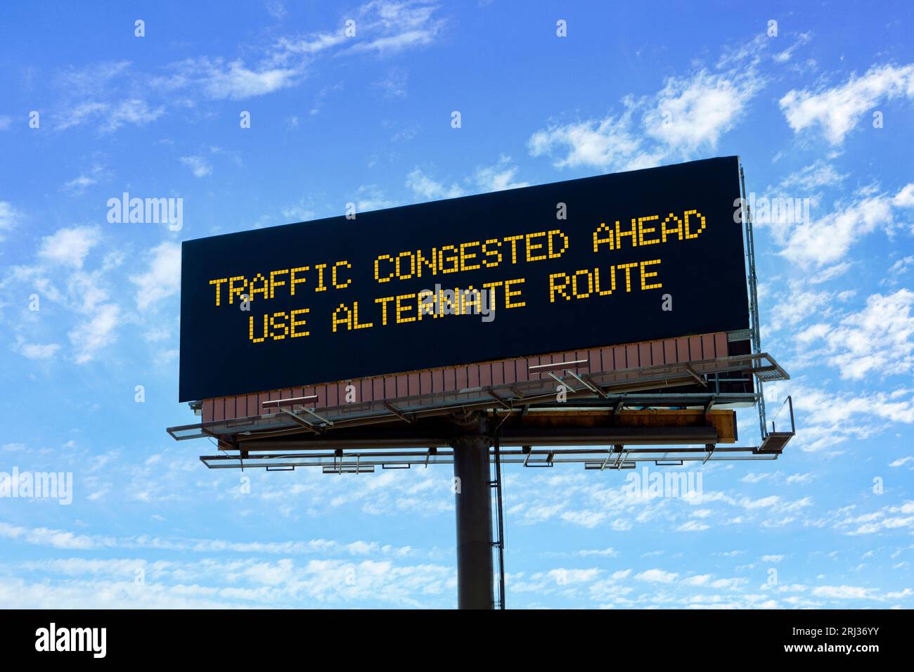 Electronic highway billboard with a traffic collision delay warning Stock Photo Alamy