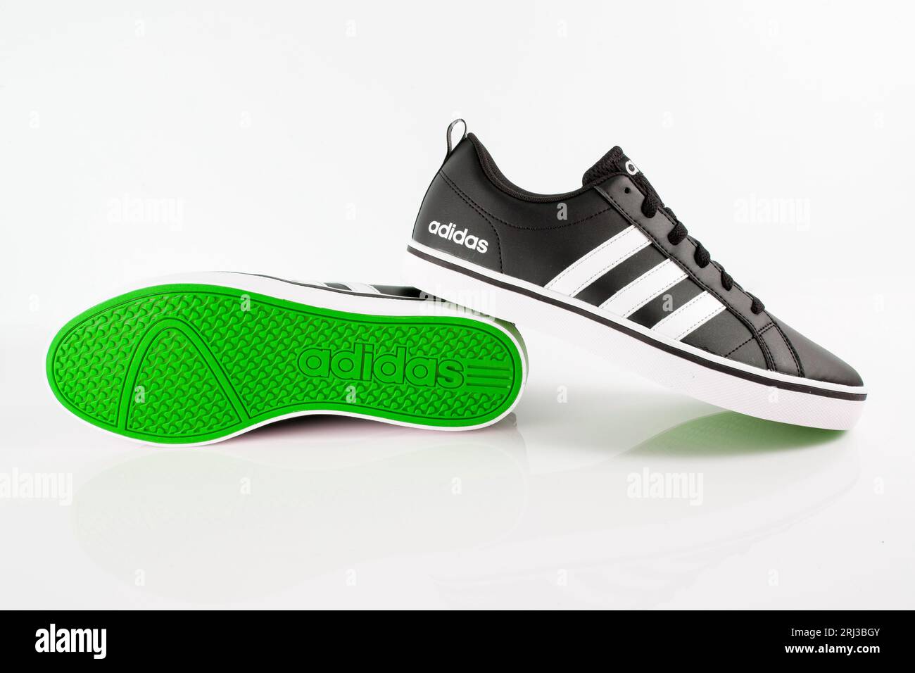 A closeup of black and white Adidas shoes on a white background Stock Photo  - Alamy