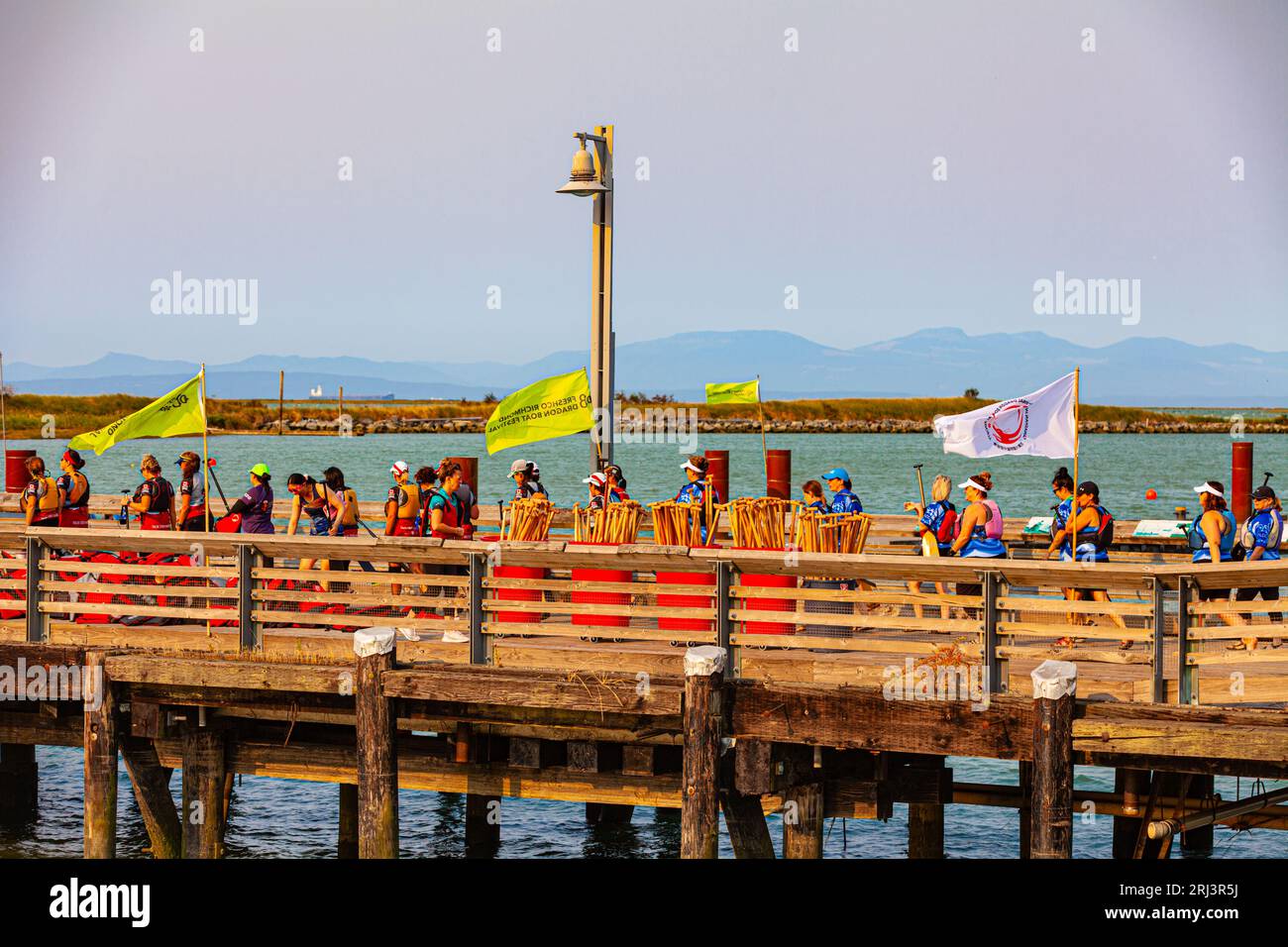 Dragon Boat teams heading to their boats in Richmond British Columbia Canada Stock Photo