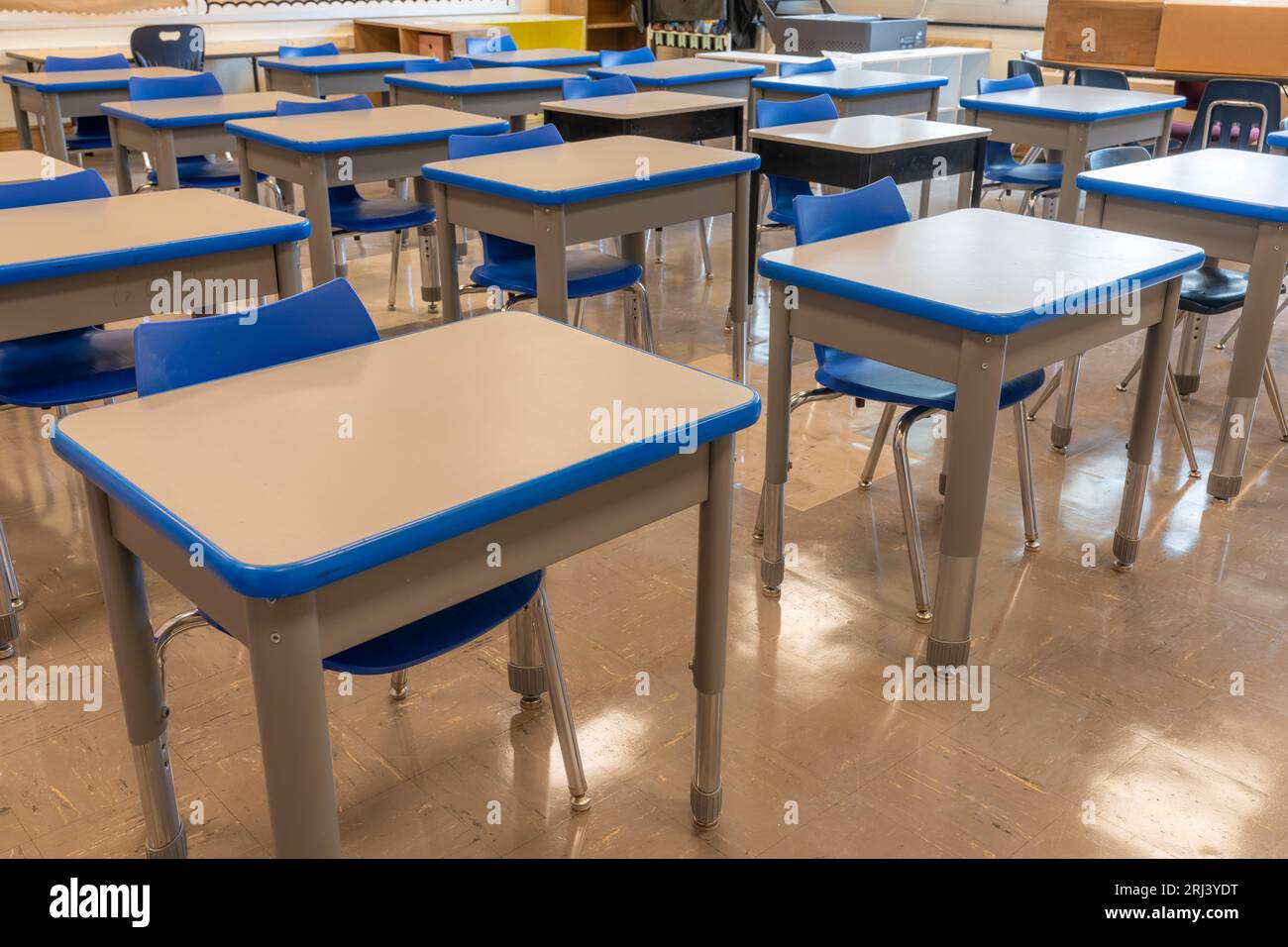 Example of an empty nondescript US High School Classroom with desks ...