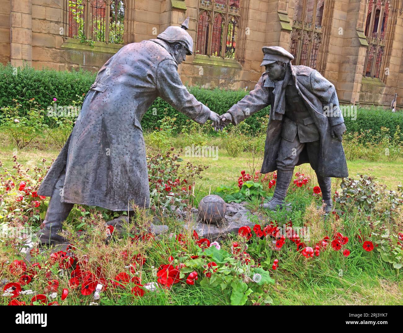 Christmas truce sculpture, known as 'All Together Now' by Andy Edwards, at St Lukes, the Bombed Out Church, Reece St, Liverpool, L1 2TR Stock Photo