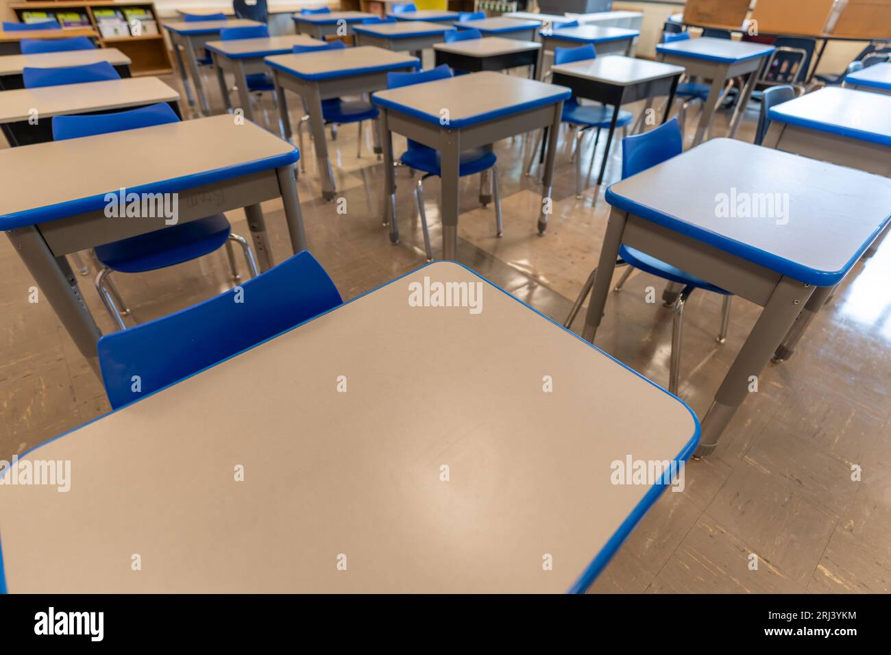 Example of an empty nondescript US High School Classroom with desks ...