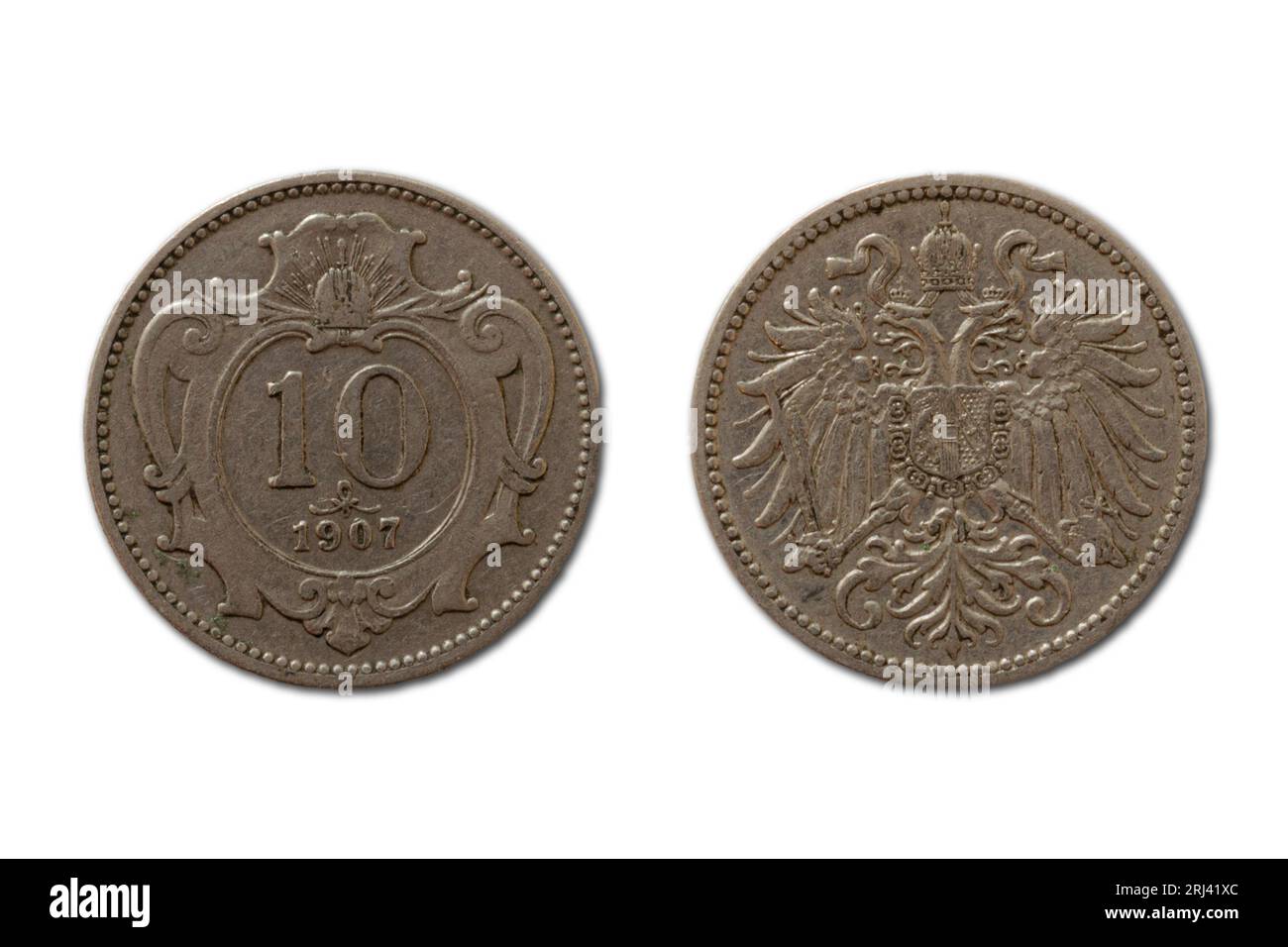 A closeup of two Austro-Hungarian 10 krone coins from 1907 Stock Photo