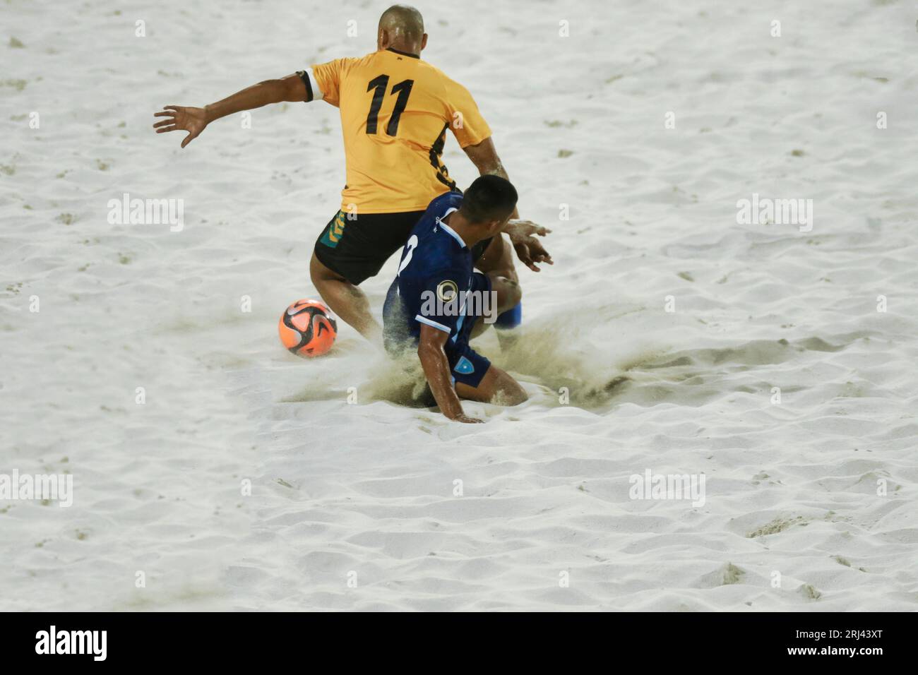 Two beach soccer teams, the Bahamas and Guatemala, compete against each