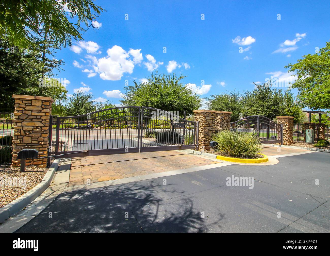 Entry And Exit Gates At Secure Subdivision Stock Photo Alamy