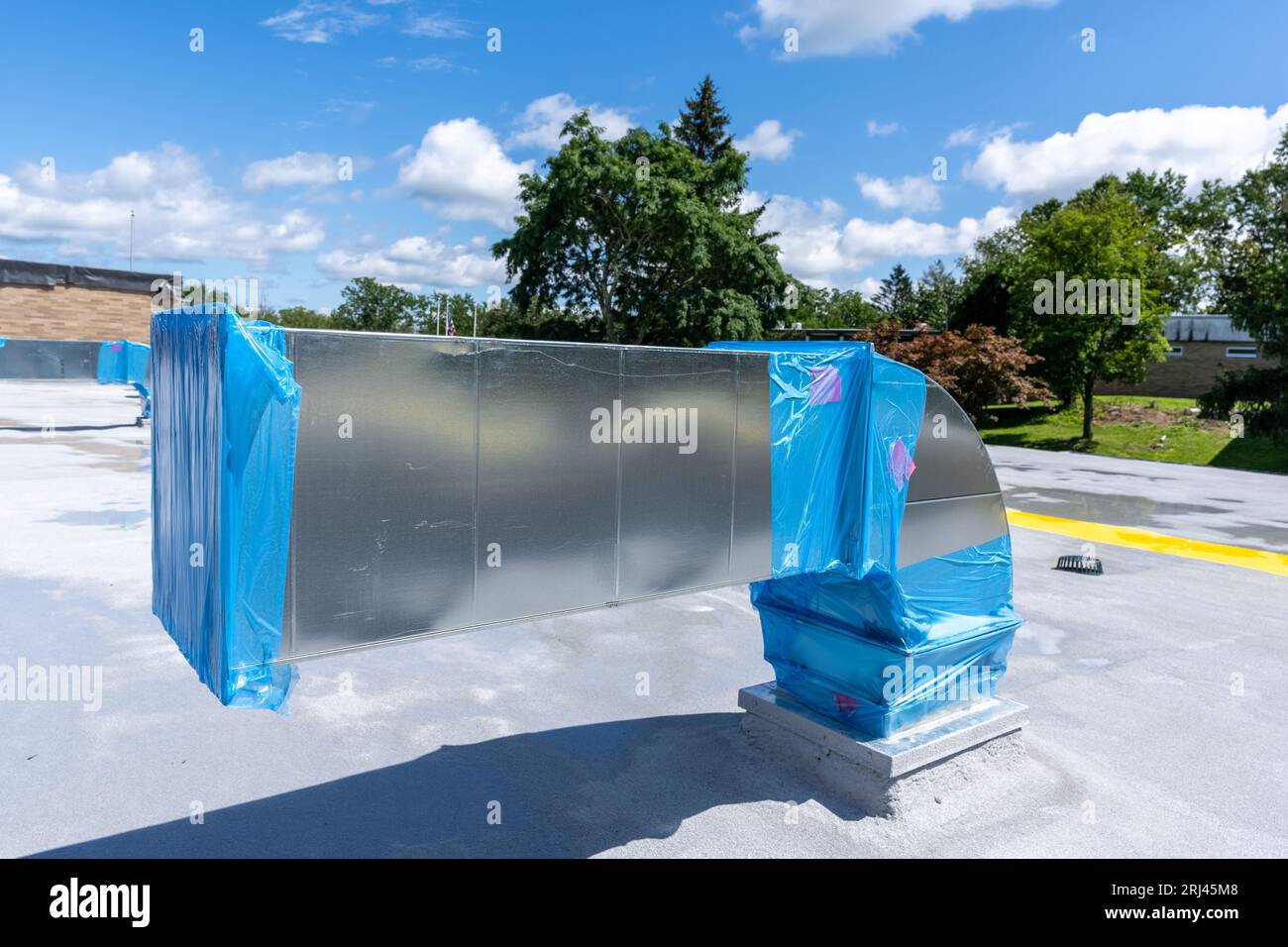 Construction of new roof mounted HVAC Ductwork waiting for new Roof Top