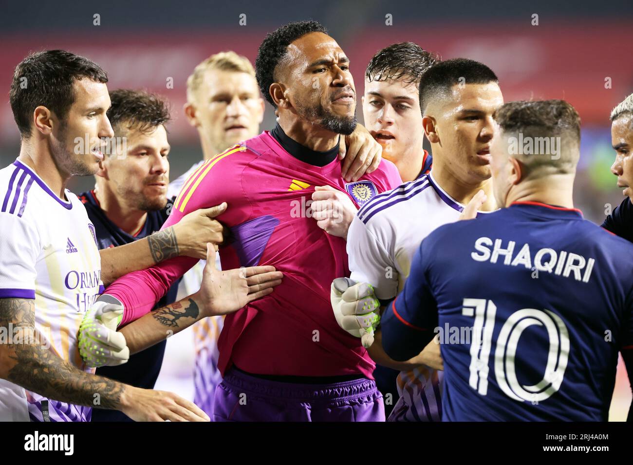 Chicago, USA, 20 August 2023. Major League Soccer (MLS) Orlando City SC goalkeeper Pedro Gallese is held back from confronting Chicago Fire FC's Xherdan Shaqiri (10) at Soldier Field in Chicago, IL, USA. Credit: Tony Gadomski / All Sport Imaging / Alamy Live News Stock Photo