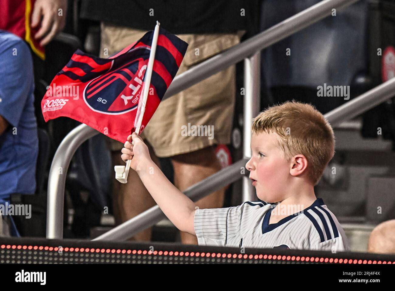 ST. LOUIS, MO - AUG 20: A young fan waives the window flag give