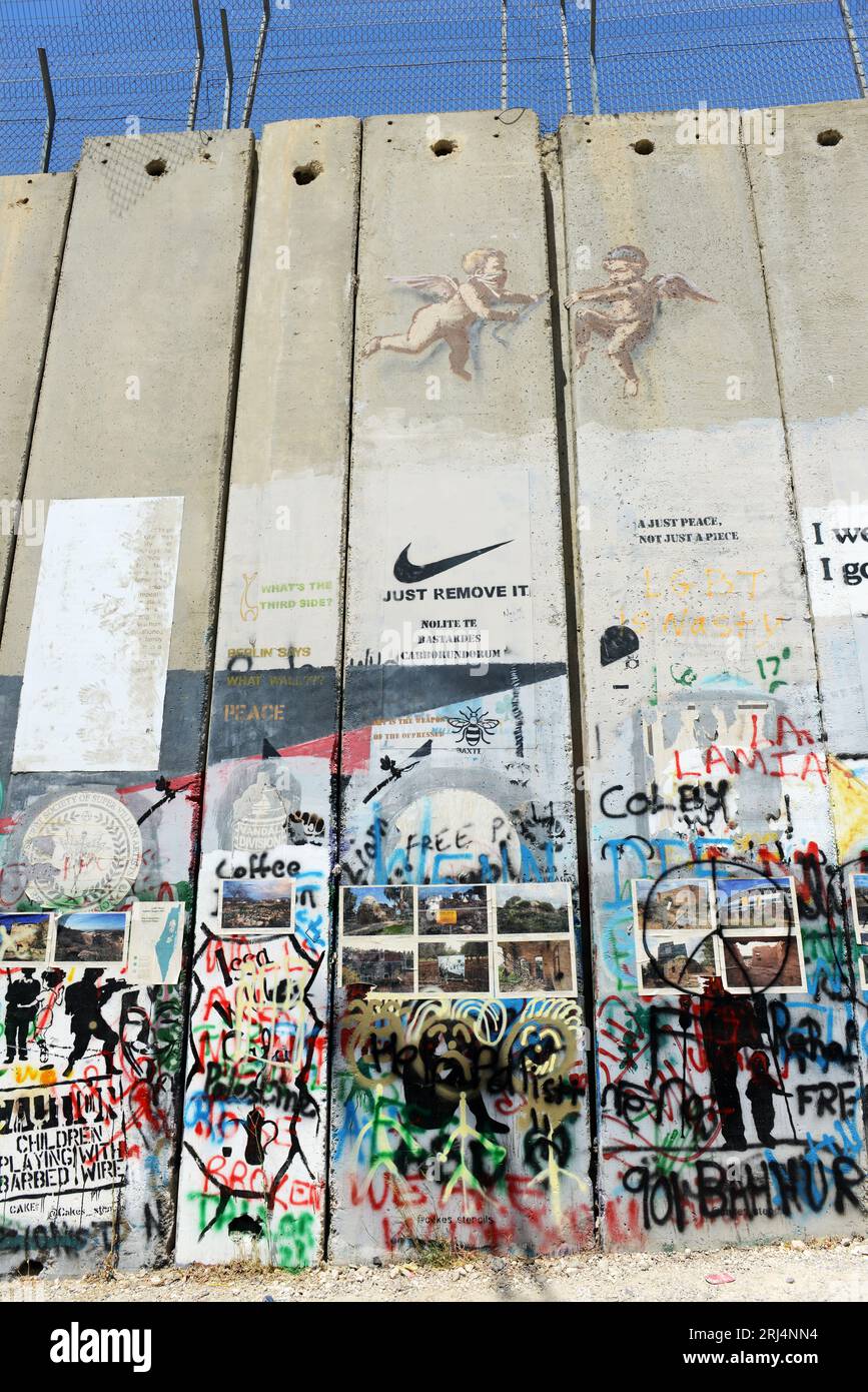 Murals on the Israeli security barrier in Bethlehem, Palestine. Stock Photo