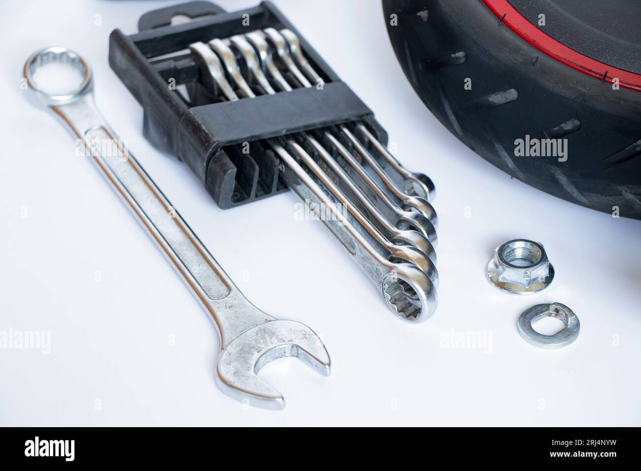 Disassembled electric scooter, wheel puncture and replacement with a