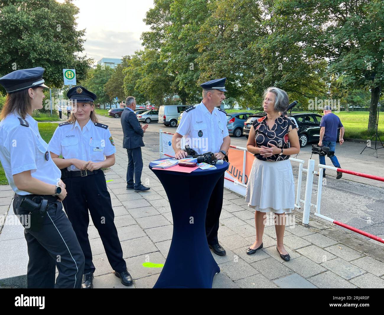 Halberstadt, Germany. 21st Aug, 2023. Tamara Zieschang (r, CDU), Interior Minister of Saxony-Anhalt, talks to police officers. At the start of the new school year, the police want to secure school routes and control traffic. Credit: Thomas Schulz/dpa/Alamy Live News Stock Photo