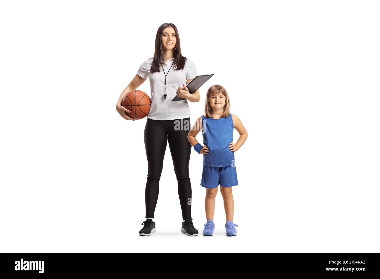 Female basketball coach posing with a little girl isolated on white