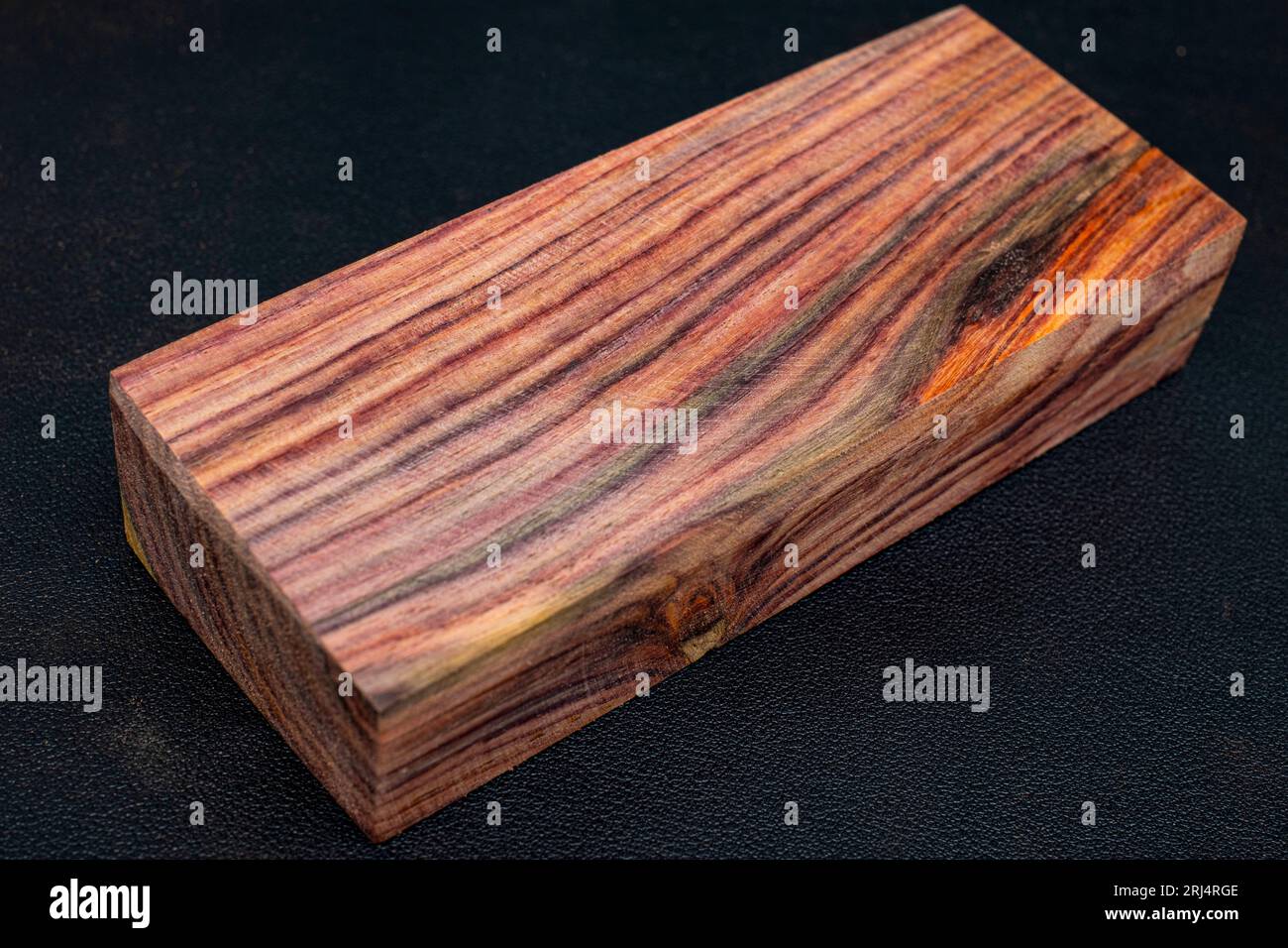 Rosewood wood timber natural at black background Stock Photo - Alamy