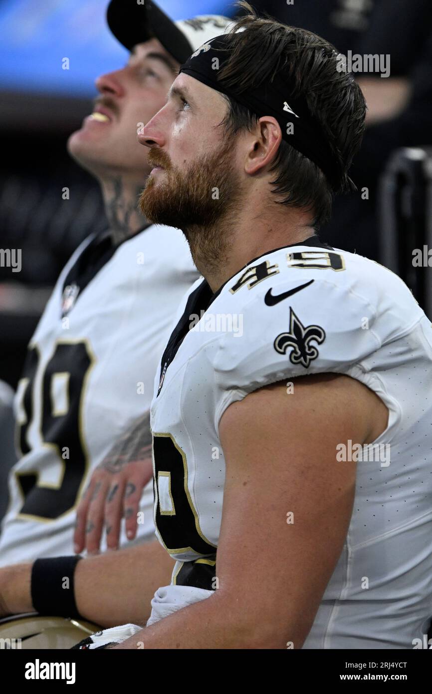 New Orleans Saints long snapper Zach Wood (49) looks up at the score ...