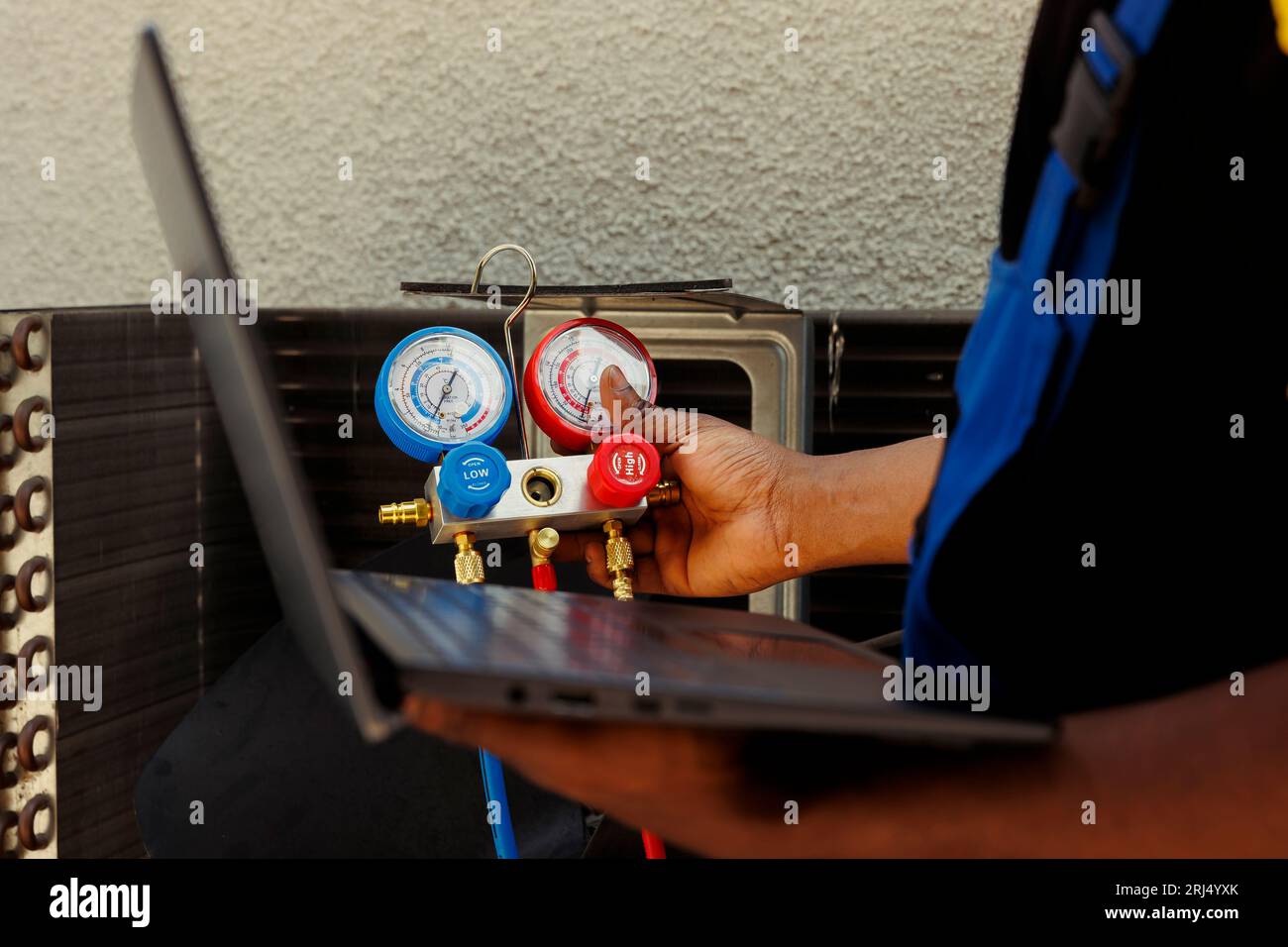 Seasoned mechanic restoring cooling capacity of air conditioning system