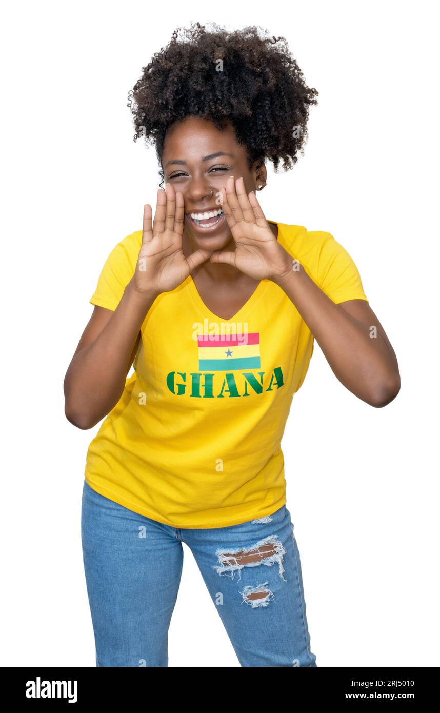 Laughing woman from Ghana supporting national football team isolated on white background for cut out Stock Photo