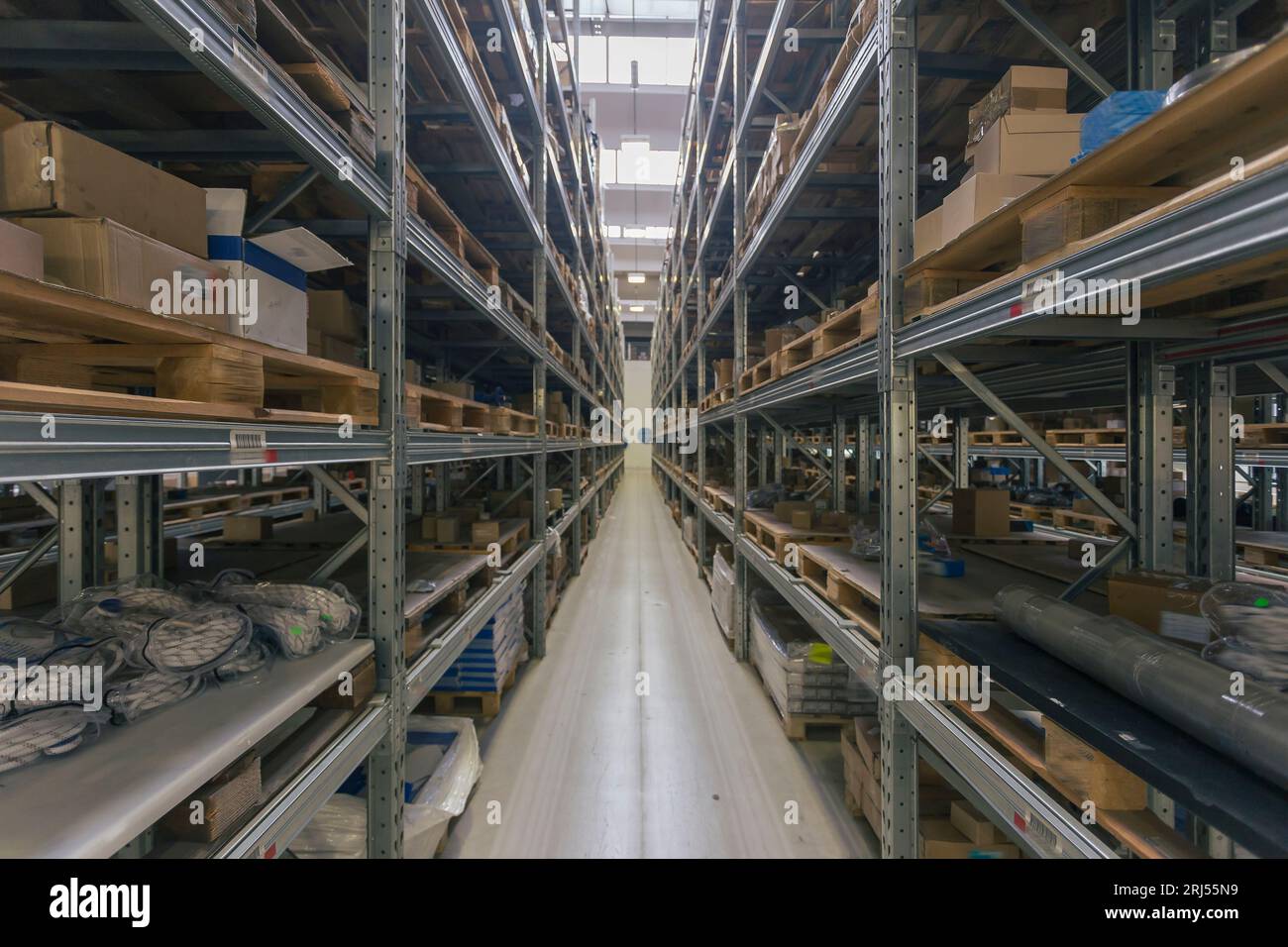 Symmetrical perspective of an industrial rack inside a commercial ...