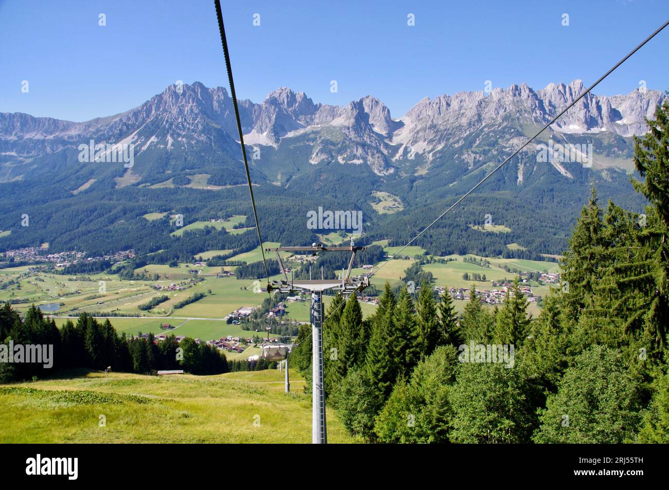 Going am Wilden Kaiser, Austria,  A view of Wilder Kaiser from an open chairlift. Stock Photo