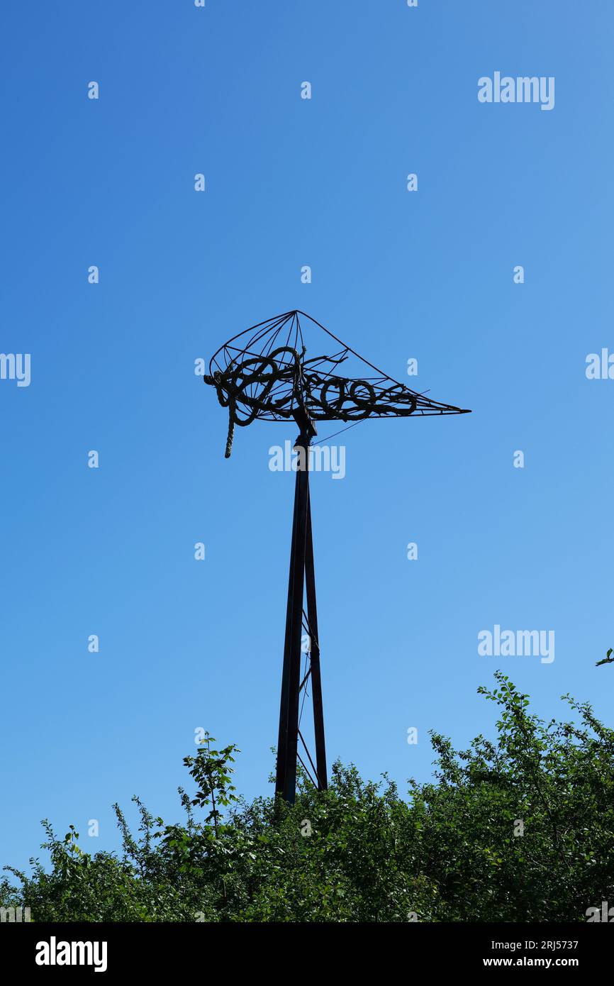 The weather vane is an art object and is located at Cape Arkona on a viewing platform Stock Photo