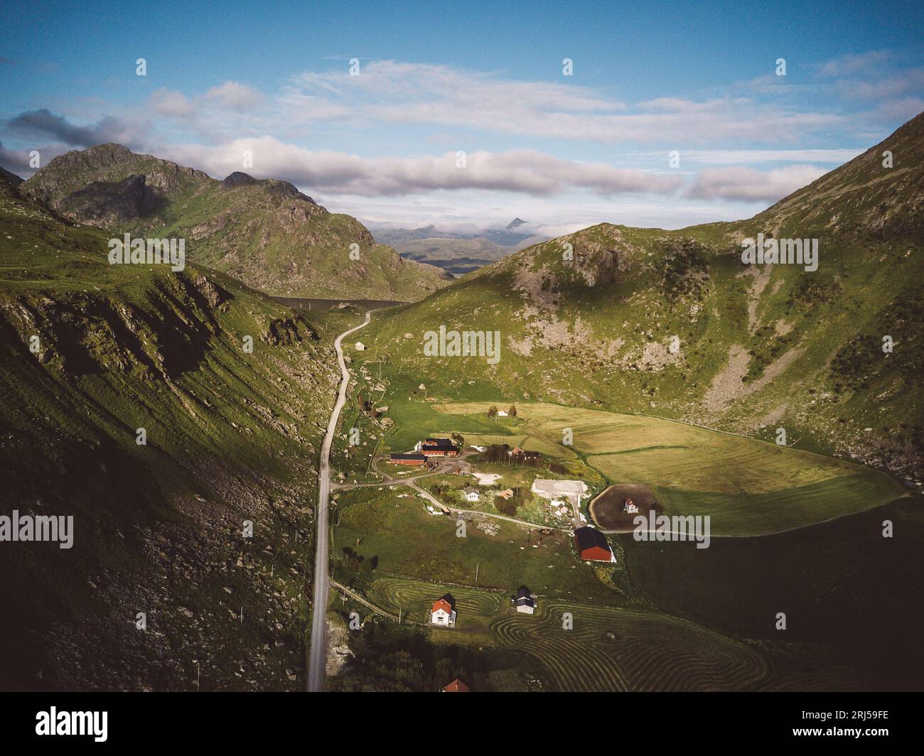 Aerial view of mountains and a village in a valley Stock Photo - Alamy