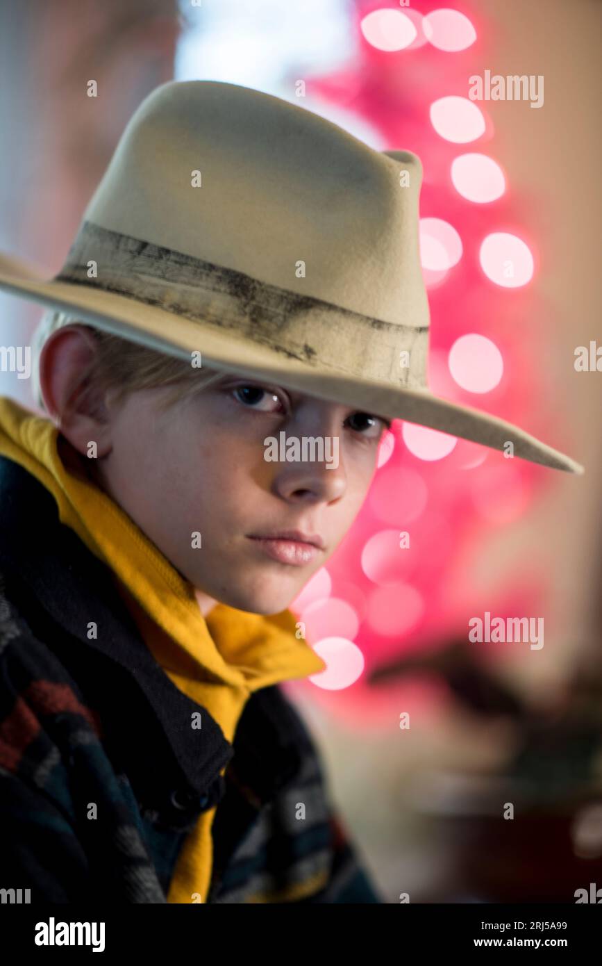 Boy wearing yellow hat hi-res stock photography and images - Alamy